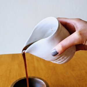 pouring caramel sauce