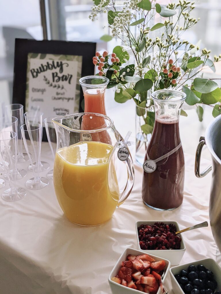 drink station with fresh juices and fruits