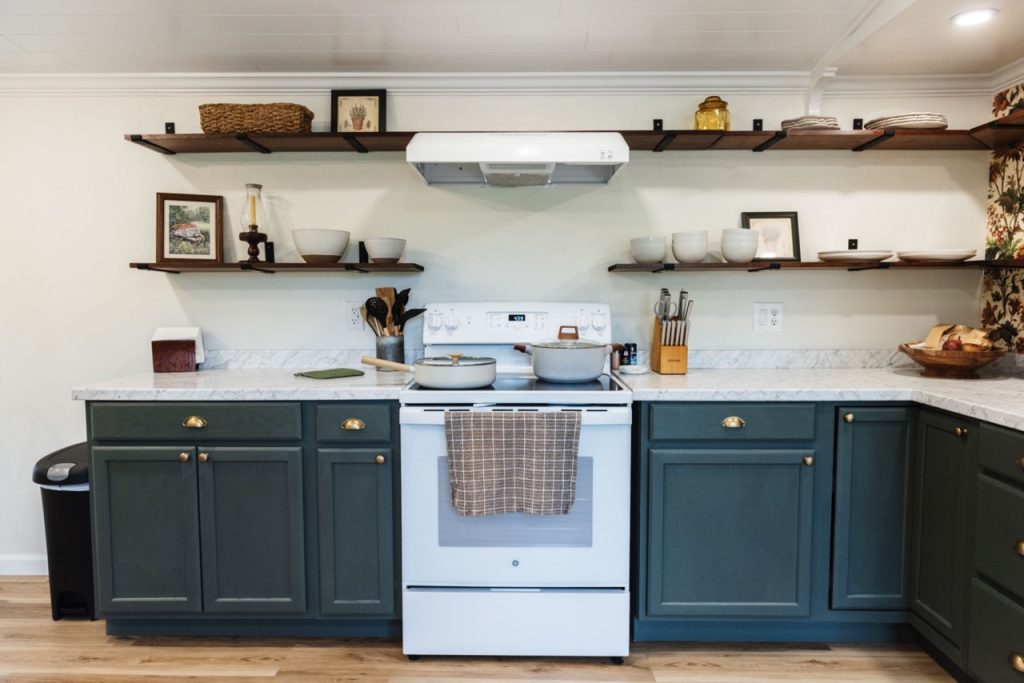 kitchen oven with plates and open shelving